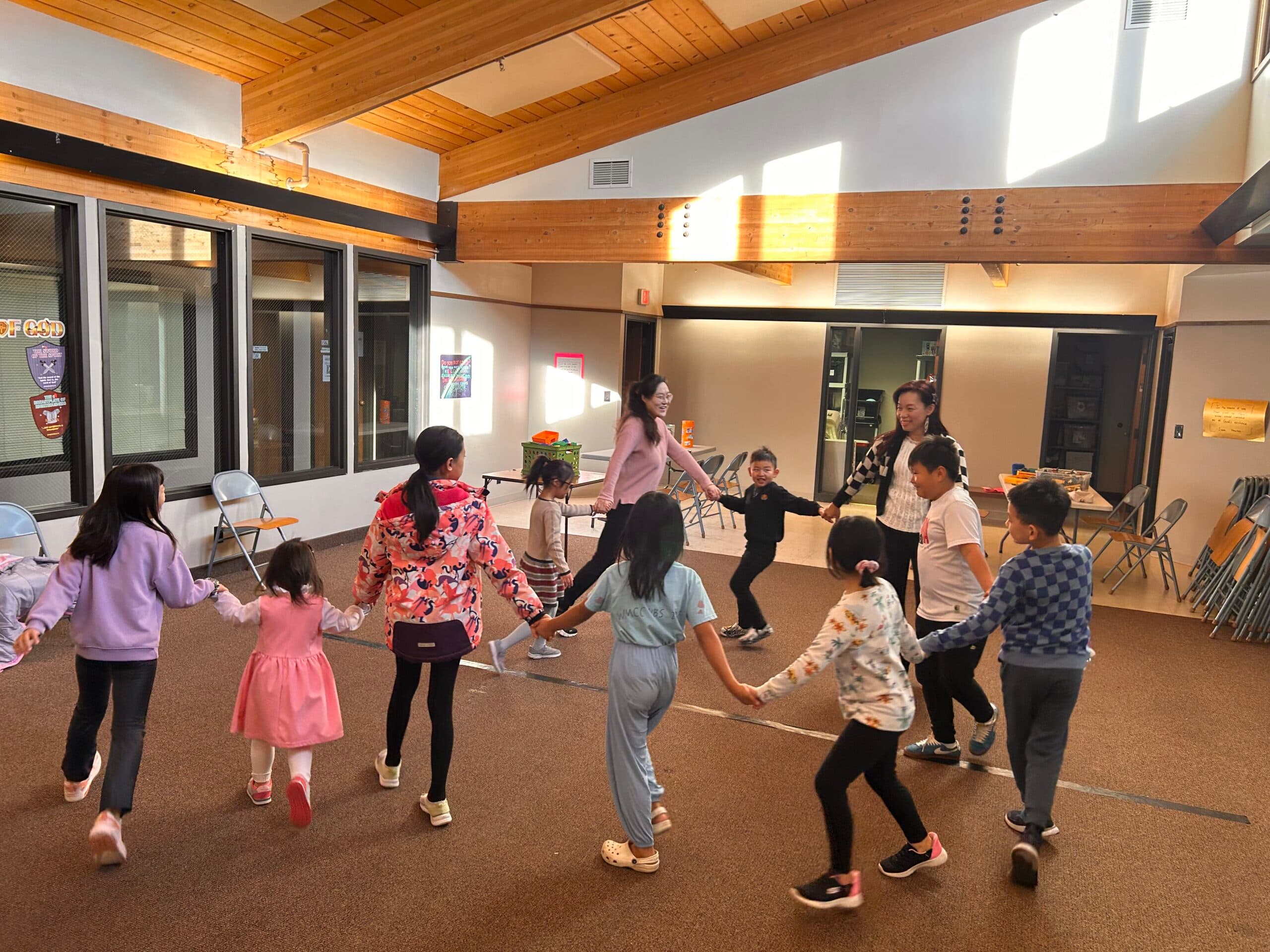 Children holding hands in a circle
